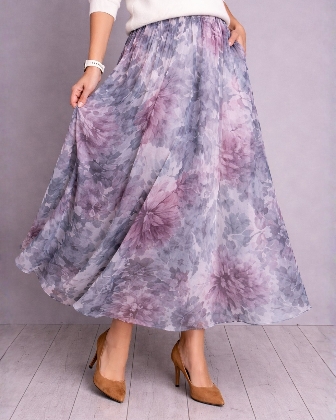 Conjunto de duas peças com blusa de malha e saia midi com padrão floral