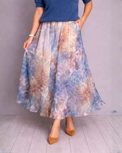 Conjunto de duas peças com blusa de malha e saia midi com padrão floral