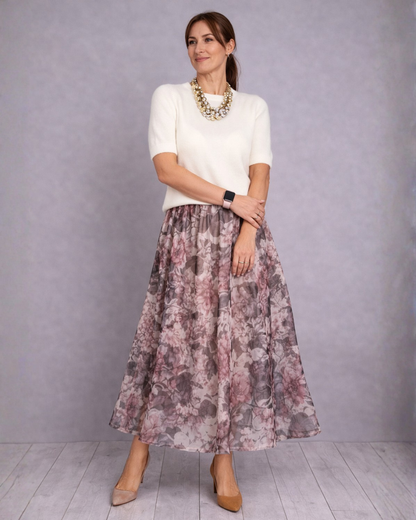Conjunto de duas peças com blusa de malha e saia midi com padrão floral